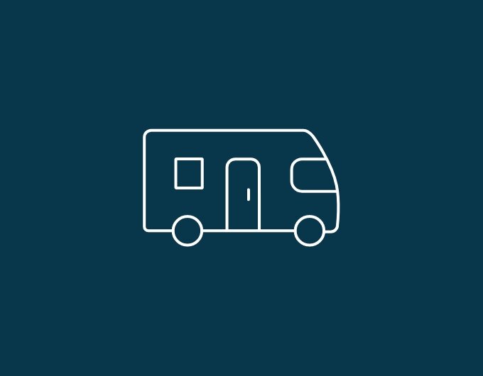 Caravan symbol as a white line graphic on a blue background