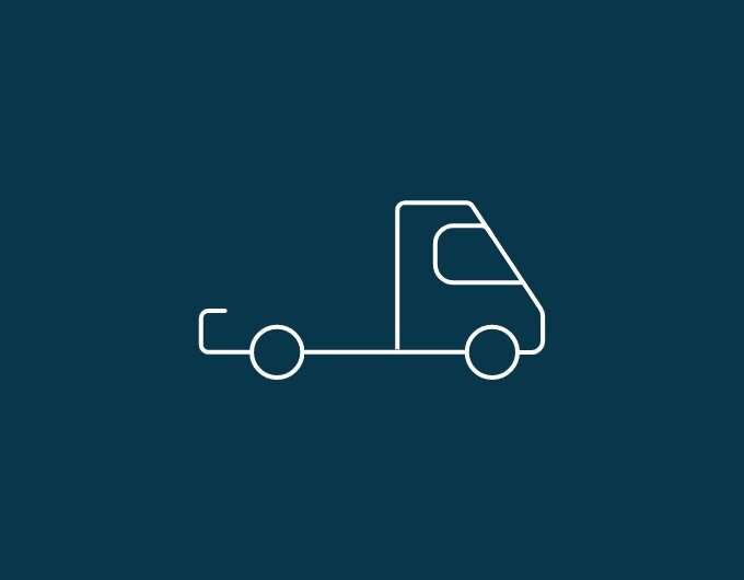 White line illustration of a chassis with cab on a dark blue background