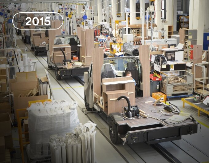 Production of Carado motorhomes in a factory hall, chassis with pre-installed furniture modules on the assembly line, year 2015